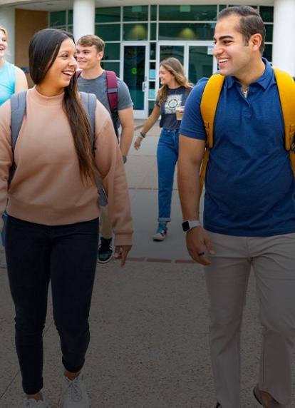 Concordia students walking outside the main building